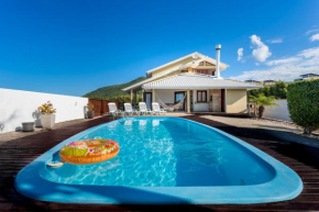 Casa com piscina frente ao mar Praia do Santinho